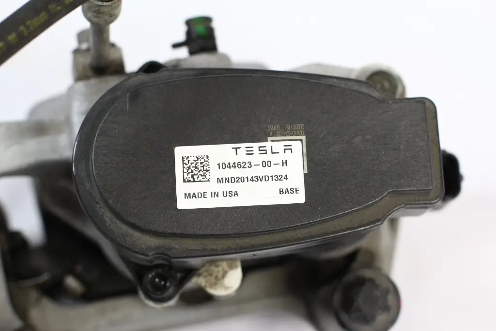 Супорт гальмівний задній лівий Tesla Model 3, 1044623-00-H